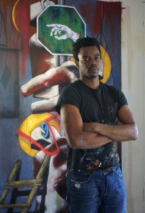 Image of Michael Banks standing in front of his painting
