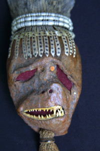 detail  "Fish Warrior" c. 2005 by Michael Whalton Grouper tail leather, avocado leather, sculptor's metal, flounder teeth, felt, brass & diamond 7.5" x 2.5"    $3200  #11297