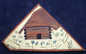 "Log Cabin" c. 1993 painted by Charles Tolliver, signed by Mose Tolliver house paint on wood triangle shape 17.5" x 31" $750 #11538