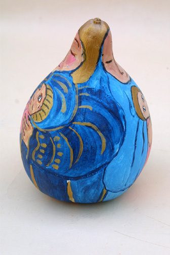 side "Mother and Child" (gourd) by Hope Atkinson    acrylic paint on found object gourd  8" x 7" x 7"  $300  #5784