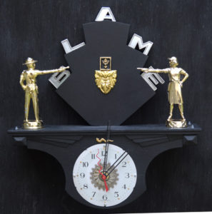 "Blame Game" Wall Clock by Jason Burnett wood, found objects: trophy parts, emblem parts, repurposed clock parts 14" x 13" x 3" $350 #12090