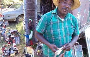 A man wearing flannel shirt on display