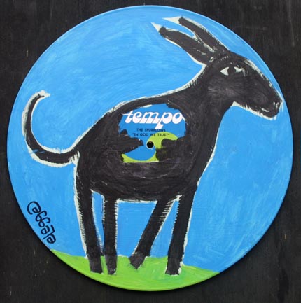 A black goat painting with the word “tempo” in the middle