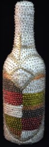 "Spirit Bottle" B Erzulie (white) by Haitian artist handsewn sequins & beads over glass bottle $200 #11747