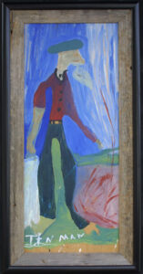 Framed artwork of a man wearing a beret