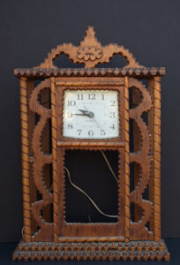 Clock Case with Original Clock c. 1963 by Howard Finster carved wood, varnish, GE clock 22" x 15" x 4.5" $1500 #13101