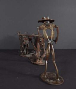 "Man Plowing with Ox Yoke" by Ray Bellew welded found metal 9" x 23" x 7" $700 #12761