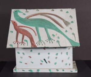 "Birdhouse with Two Men and Birds" c. 1992 by Mose Tolliver house paint on handmade wooden birdhouse 13.5" x 14.5" x 12.5" $2600 #13377