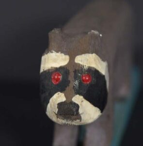 "Racoon" by Braxton Ponder mixed media on carved wood 4.5" x 1.5" x 13.5" $200 #13386