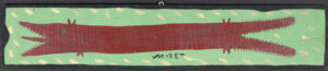 "Big Red Fish" c. 99 by Mose Tolliver paint on wood 7.75" x 39" $1200 #13476