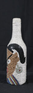 Haitian Sequined Bottle (Lwa Bosson) sequins on glass bottle 11.25" x 3" x 3" $200 #13666