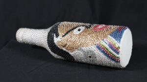 Haitian Sequined Bottle (Lwa Bosson) sequins on glass bottle 11.25" x 3" x 3" $200 #13666